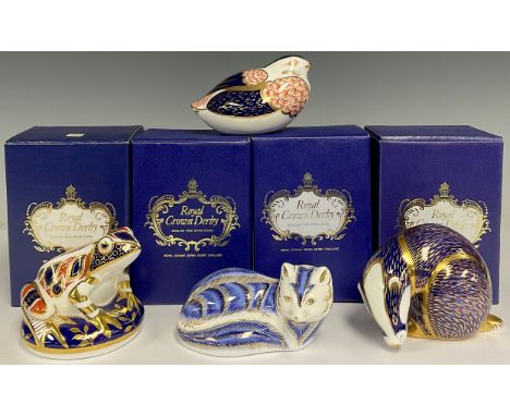 A Royal Crown Derby paperweight, Badger, gold stopper, 7.5cm high, boxed; others, Frog, integral ceramic stopper, 7.5cm high,