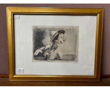 A Pinocchio print, framed