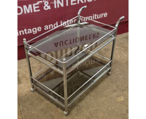 An Italian style chrome and smoked glass cocktail trolley 