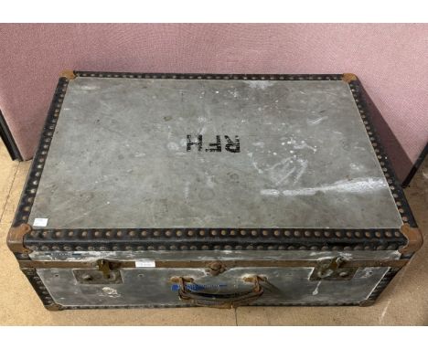 An early 20th Century steamer trunk, containing a collection of architectural drawings