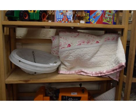 Set of three glass light shades and a bed cover