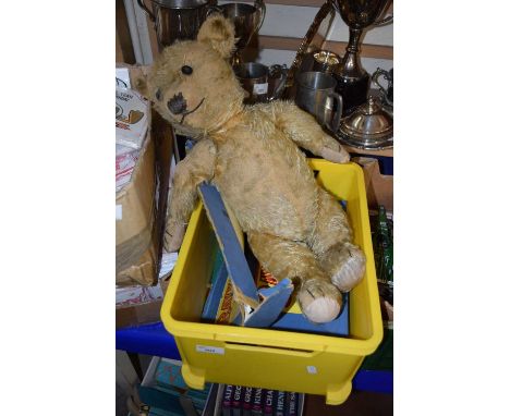 A vintage mohair covered teddy bear, very worn condition together with a quantity of Bayko construction kit items