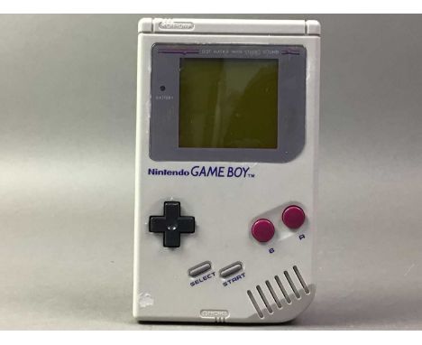 NINTENDO GAME BOY CONSOLE WITH GAMES GOLF, TETRIS AND MONSTER TRUCK WARS in GameMate carry case