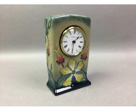 MOORCROFT HYPERICUM PATTERN MANTEL CLOCK tube lined decoration, stamped and printed marks to base16cm highHas some crazing, n