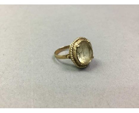 QUARTZ DRESS RING AND FOUR OTHERS each in nine carat gold (5)Qty: 11.42g gross 