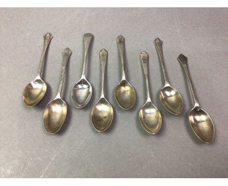 GROUP OF SILVER TEASPOONS along with a silver and a white metal napkin ring