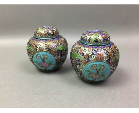 PAIR OF CHINESE CLOISONNE ENAMEL GINGER JARS EARLY 20TH CENTURY the lotus pattern in relief against silver plated copper body