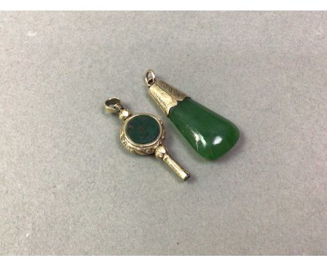 YELLOW METAL MOUNTED NEPHRITE JADE PENDANT AND A VICTORIAN YELLOW METAL WATCH KEY  the key set with bloodstone and carneliant