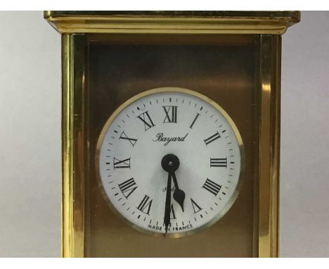 FRENCH BRASS CARRIAGE CLOCK AND A SMALL BRASS CLOCK the carriage clock's circular white dial with roman numeralsQty: 2