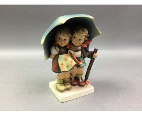 GROUP OF HUMMEL FIGURES including a child posting a letter, two children under an umbrella and a girl with a basket of chicks