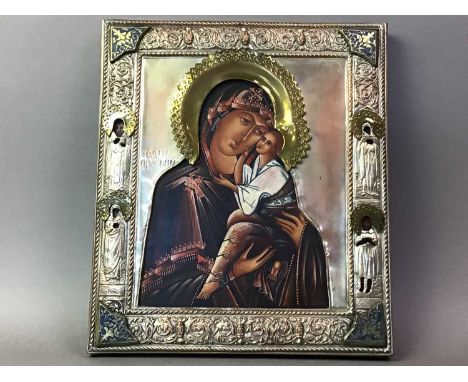 REPRODUCTION ICON DEPICTING THE MADONNA AND CHILD on wood panel with silver plated and gilded mount30cm x 27cm overallThe ico