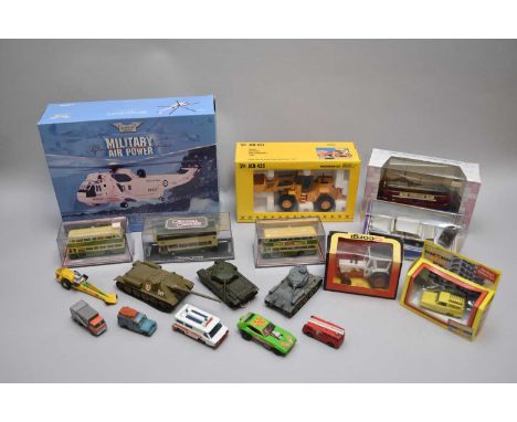 A collection of various boxed and unboxed die-cast vehicles, including Corgi Circus, boxed, Corgi Westland Sea King, boxed, C