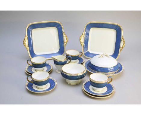 A Wedgwood blue and gilt tea service, pattern X9749/T, retailed by Philip's Ltd 43 + 44 New Bond Street London, the service c