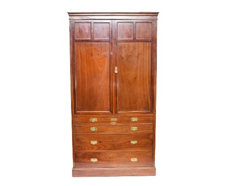 A large Austrian mahogany filing cabinet, circa 1900, the moulded cornice above twin panelled doors enclosing 33 file drawers