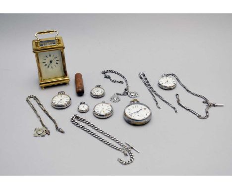 A brass carriage clock with key, together with a collection of five silver cased pocket watches and fob watches, a silver pla