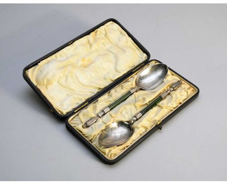 A cased pair of silver spoons with jade handles, B &amp; C, Birmingham 1896, with figural terminalsCondition report: Hallmark