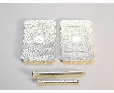 A Victorian silver card case, Robert Thornton, Birmingham 1877, with engraved foliate and geometric decoration and with centr