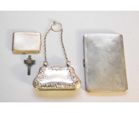 An Edwardian silver purse, Henry Matthews, Birmingham 1906, with embossed floral and scroll decoration, together with an engi