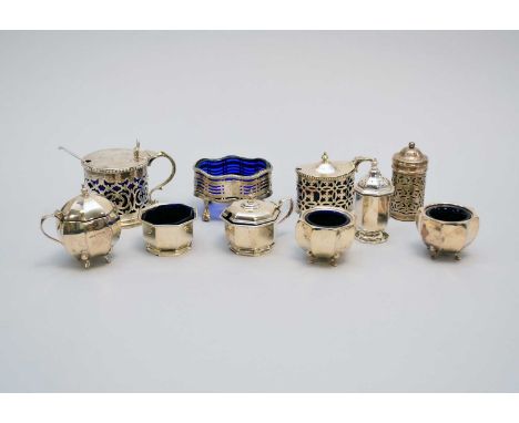 A collection of silver cruets, comprising; a mustard, salt and pepperette by Mappin &amp; Webb, a suite of three octagonal ex