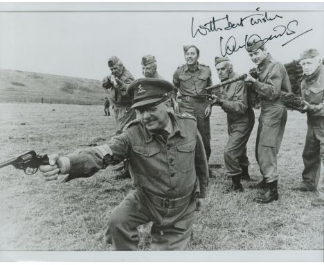 Ian Lavender signed black and white movie still from  Dad`s Army. Measures 8 inch by 10 inch appx. Good Condition. All autogr