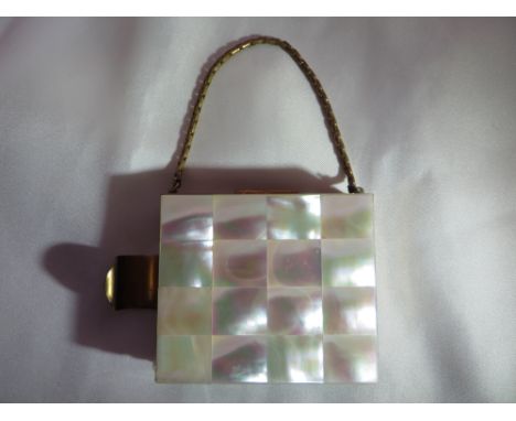 A vintage Mother of pearl compact, lipstick holder and card case.