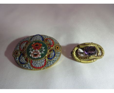 A Victorian YM and Amethyst brooch and a Victorian micro mosaic brooch.