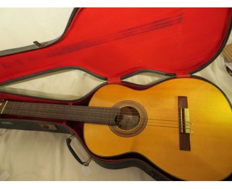 A vintage Vicente Tatay Tomas classical Spanish guitar with original carry case. PLEASE NOTE THAT THIS ITEM IS EXCLUDED FROM 