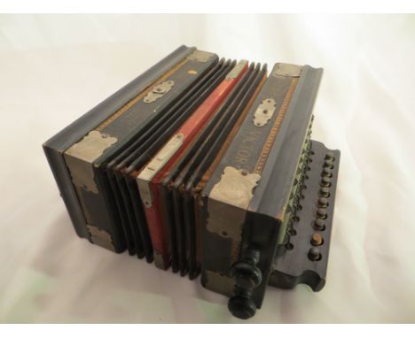 A vintage accordion / squeeze box "The Victor"