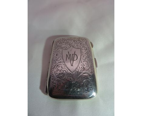 A 1921 silver cigarette case. Front cartouche engraved with "MVD". Birmingham, WH Haseler Ltd. Weight: 44.6g