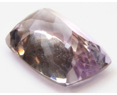Gemstones, a loose cushion cut Natural Ametrine stone measured at 28.91 carats, with a testing report and other paperwork fro