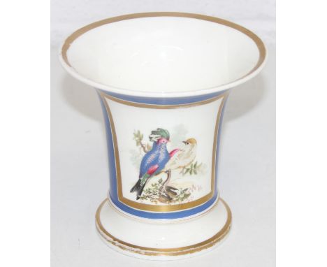 A rare early 19th century Rockingham flared rim vase decorated with a vignette of 2 exotic birds within a blue ground and gil