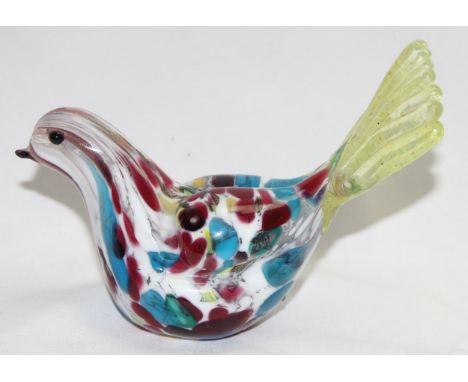 A vintage glass bird with colourful glass body and golden tail, likely by Murano, remnants of label to base, approx 13cm wide