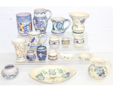 A large collection of Poole and Honiton pottery items, mainly vases and jugs to inc some earlier Cart Stabler &amp; Adams mar