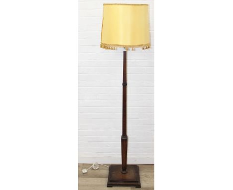 An Art Deco period oak standard lamp with shade, stepped square base, 185cm tall