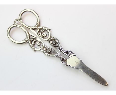 [107.66g] - a pair of cast silver grape scissors, marked for London 1991 by Mappin &amp; Webb, 16cm long
