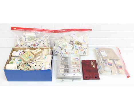 Two boxes of cigarette, trading and collectors cards to include "Henry", Como Confectionery, Tazos and a Kardomah Tea card