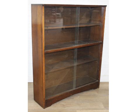Mid-20th century oak bookcase with two sets of glass sliding doors, 91cm x 25cm x 113cm