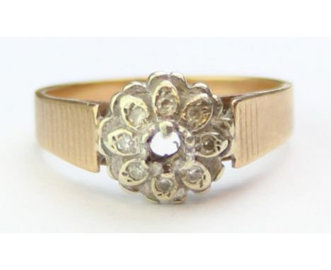 [3.44g, O] - a retro 9ct gold and floral set diamond ring, the centre stone missing, marked for London 1975