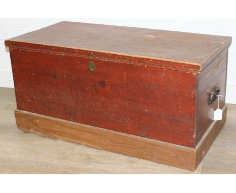 A vintage stained pine trunk or tool box with iron handles, 90cm x 44cm x 43cm
