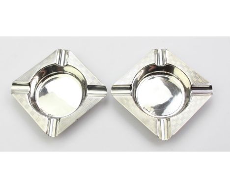 [93.43g] - a matched pair of Art Deco period silver ashtrays with engine turned decoration, Birmingham 1922 &amp; 1924 by Jos