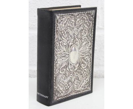 A silver mounted Little Oxford Dictionary by Clarendon Press of Oxford, the front marked for Sheffield 1991 by Carr's, 16cm x