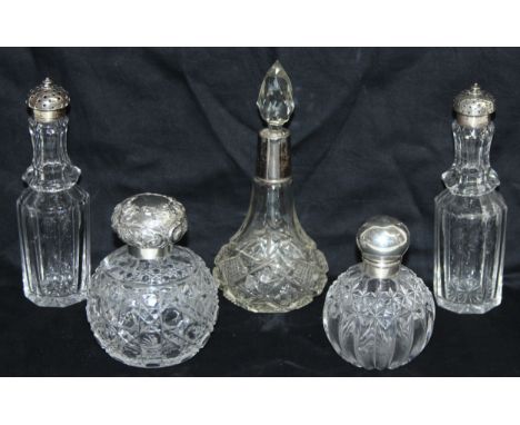 Five hallmarked silver-topped cut-glass bottles to incl salt and pepper shakers, and scent bottles, tallest 19cm [5]