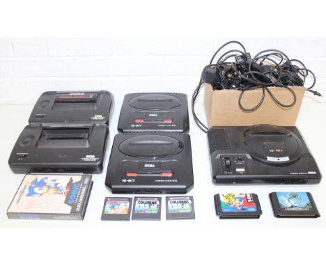 Qty of vintage Sega games consoles to incl Master System II, Mega Drive, Mega Drive II x 2, with assorted game pads, some gam