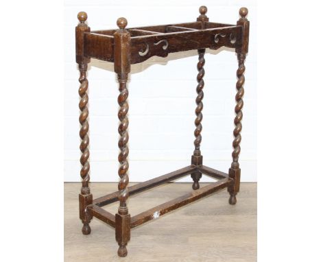 An antique oak stick or umbrella stand with carved details, early 20th century, 60cm x 23cm x 76cm