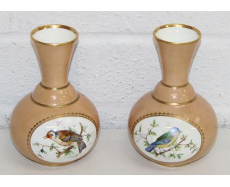 A pair of antique Copeland vases, decorated with vignettes of birds to inc a Blue Tit &amp; a Gold Finch, the other side with