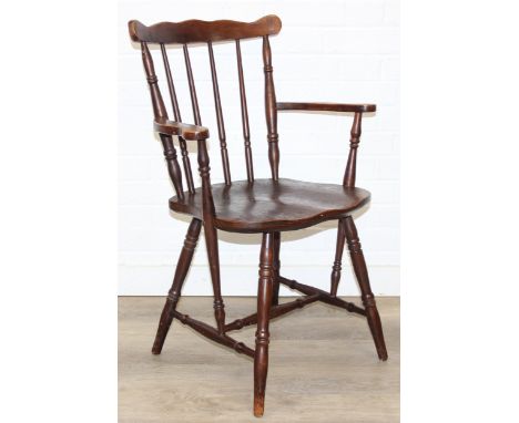 A vintage farmhouse stickback armchair of unusual form, 86cm tall