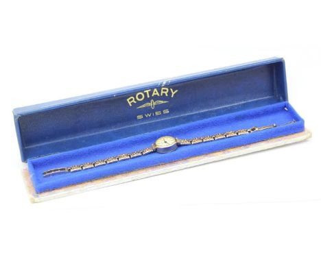 [12.52g] - a retro 9ct gold ladies watch by Rotary, retro textured 9ct gold strap, the case marked for London 1970 and the st