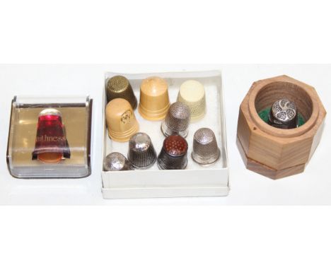 Qty of assorted thimbles to inc six silver examples both marked and unmarked with a heavy cast silver example by Elizabeth Ja