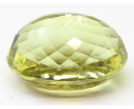 Gemstones, a loose oval cut Natural Lemon Quartz stone measured 19.71 carats, with a testing report and other paperwork from 