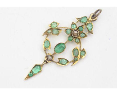An antique pendant set with diamonds and emeralds, the metal unmarked but XRF testing around 10ct gold, likely American or pl